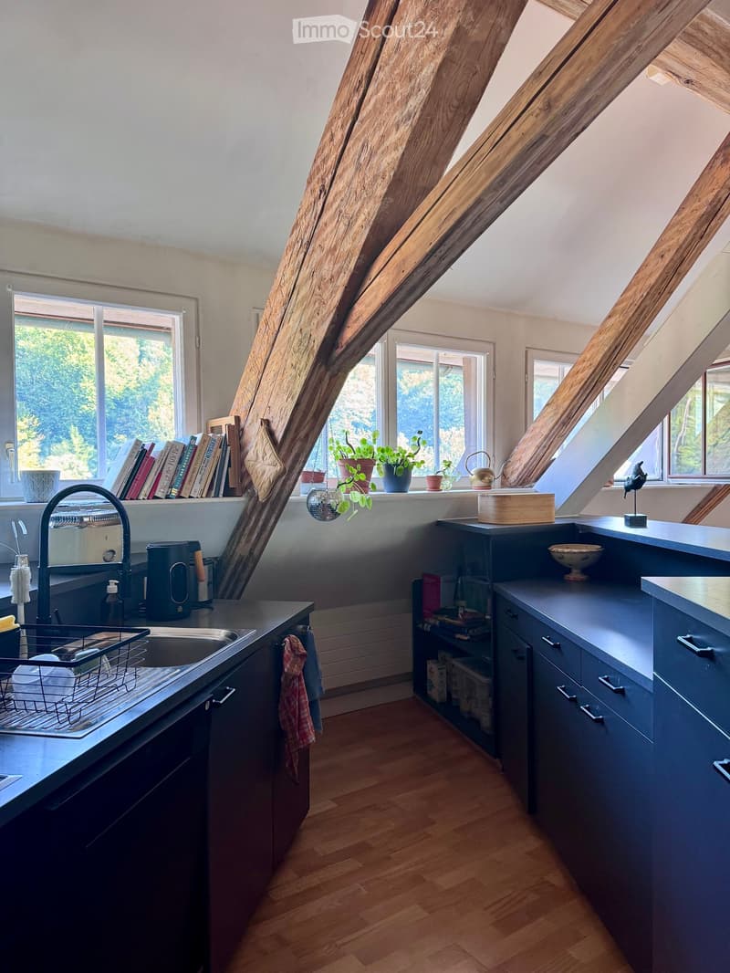 {"type": "Kitchen", "objects": ["sink", "faucet", "dish rack", "cupboard", "drawer", "books", "teapot", "plant", "bowl", "faucet", "cup", "cupboard", "faucet", "faucet", "cupboard", "cupboard", "cupboard", "cupboard", "cupboard", "cupboard", "cupboard", "