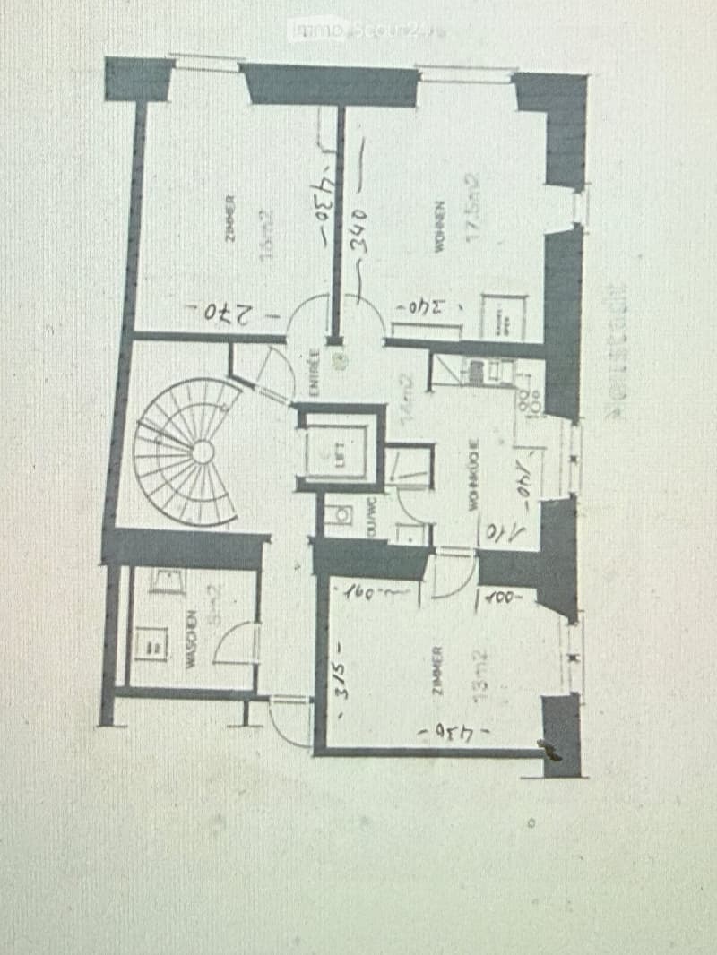 Floor plan showing a layout with multiple rooms including a living room, kitchen, bedrooms, and bathrooms.