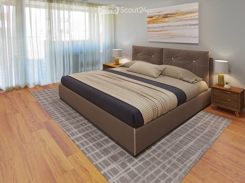 Modern bedroom with a large bed, nightstands, lamps, and artwork on the wall.