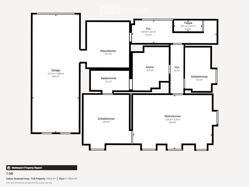 Floor plan of a house with a garage, living room, kitchen, bedrooms, bathrooms, and staircase.