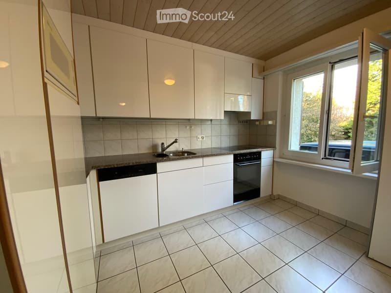 white kitchen with cabinets, sink, dishwasher, oven, granite countertops
