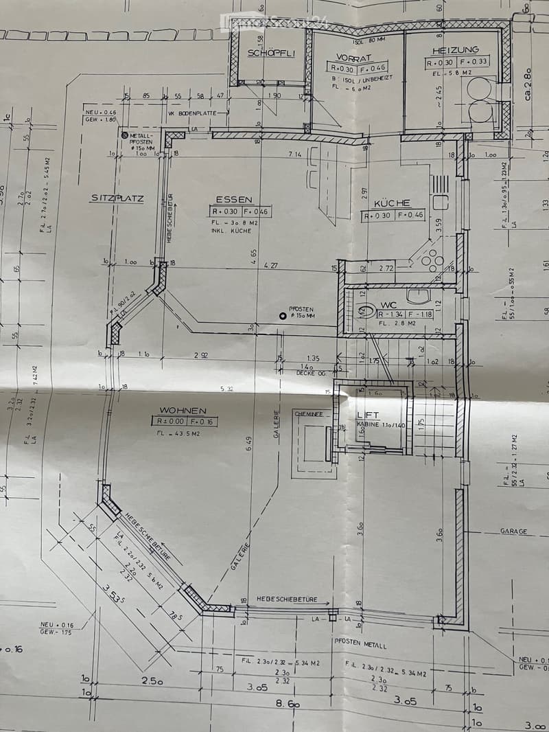 Floor plan showing a layout with labeled rooms including a kitchen, living area, dining area, sitting area, WC, and garage.