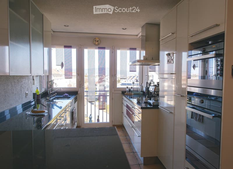 {"type": "Kitchen", "objects": ["sink", "faucet", "oven", "refrigerator", "cabinets", "countertop", "blinds", "oven hood", "cupboard", "bottle", "fridge", "oven", "cupboard", "oven", "oven", "oven", "oven", "oven", "oven", "oven", "oven", "oven", "oven",
