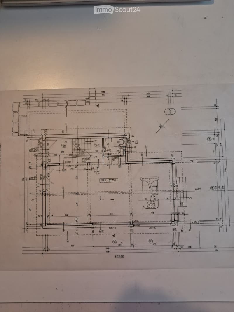 Floor plan of a residential space showing multiple rooms including a kitchen, living area, and several bedrooms with labeled dimensions and room numbers.
