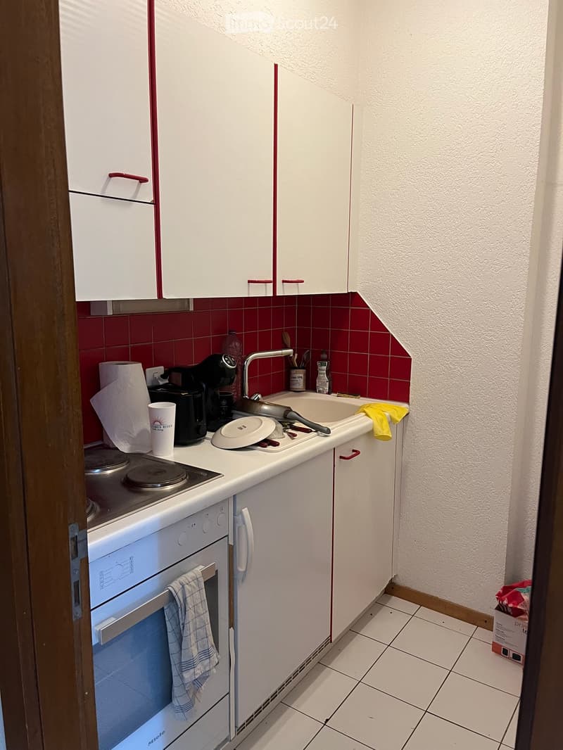 {"type": "Kitchen", "objects": ["oven", "faucet", "sink", "coffee maker", "cup", "oven mitt", "oven mitt", "oven mitt", "oven mitt", "oven mitt", "oven mitt", "oven mitt", "oven mitt", "oven mitt", "oven mitt", "oven mitt", "oven mitt", "oven mitt", "oven