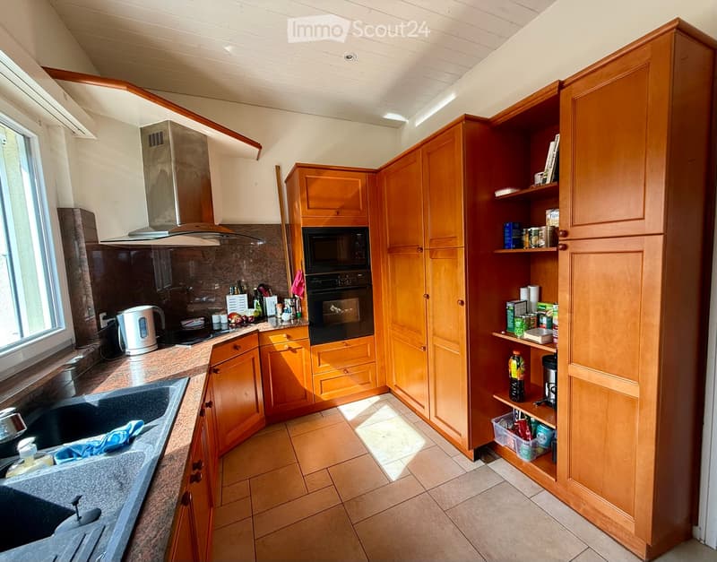 {"type": "Kitchen", "objects": ["sink", "oven", "microwave", "cabinets", "faucet", "cupboard", "bottle", "cup", "bottle", "oven", "microwave", "cupboard", "cupboard", "cupboard", "cupboard", "cupboard", "cupboard", "cupboard", "cupboard", "cupboard", "cup