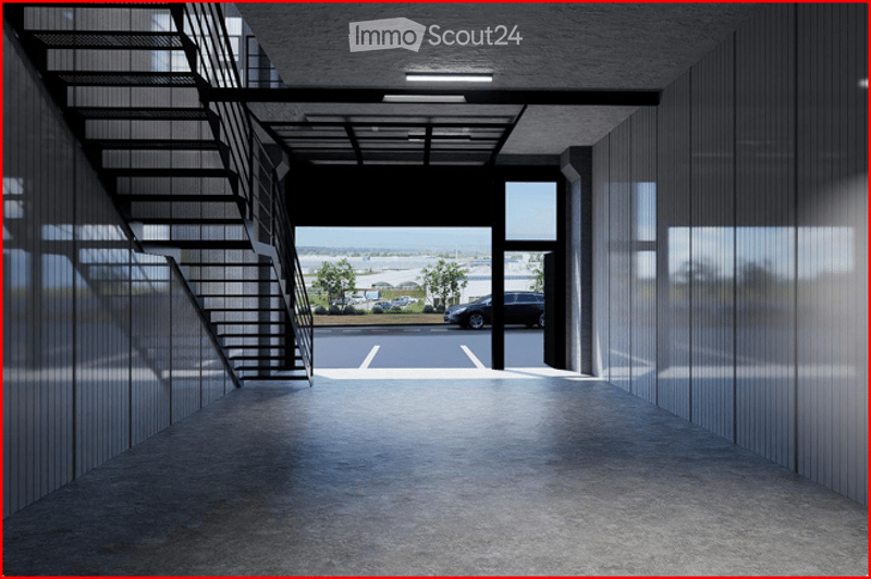 Modern, open corridor with a staircase on the left, leading to an outdoor parking area visible through large glass windows.