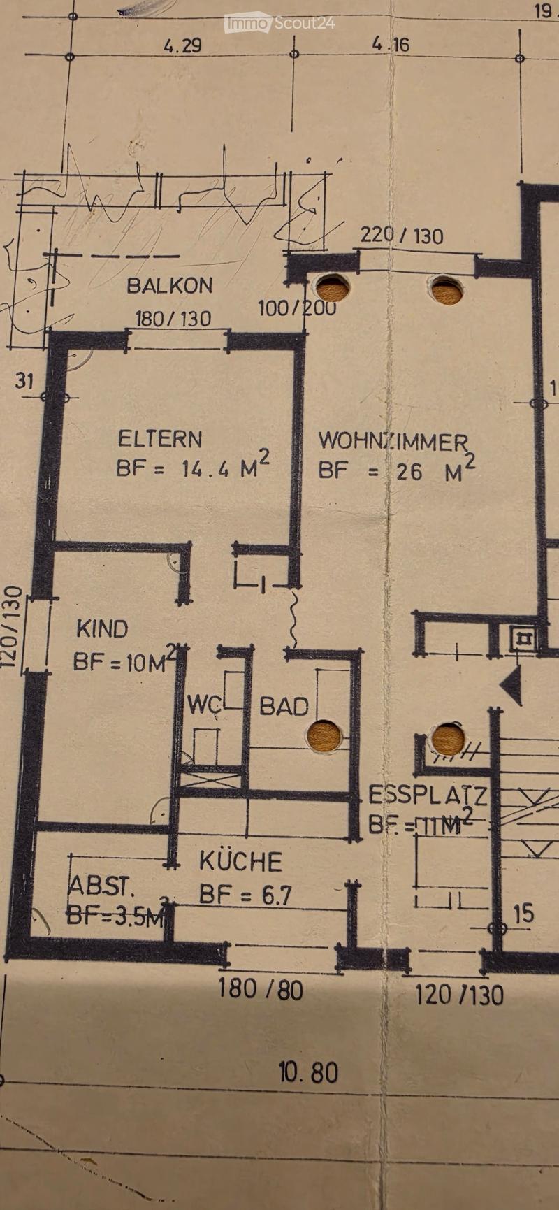 Floor plan showing a living room, kitchen, two bedrooms, bathroom, and balcony.