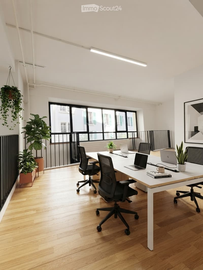 Bright, modern office space with large windows and a balcony view, featuring a white table, black chairs, laptops, and potted plants.