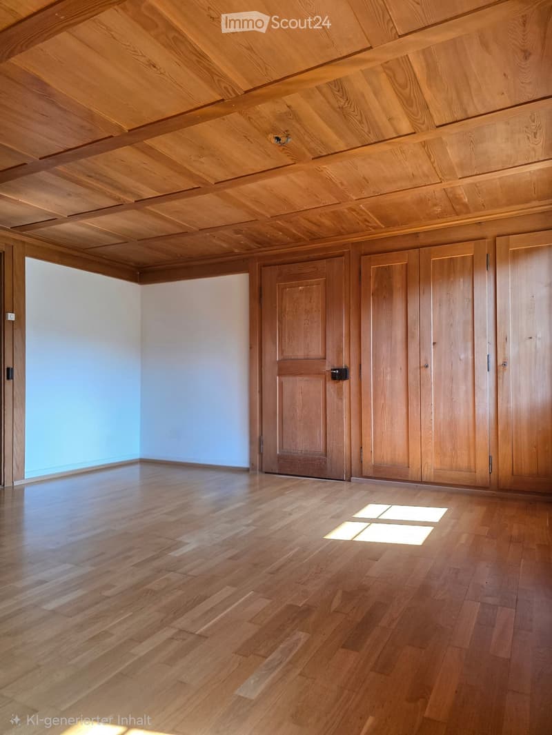 Empty room with wooden floor, wooden ceiling, and built-in wooden cabinets. Large window on one side, recessed lighting in the floor.