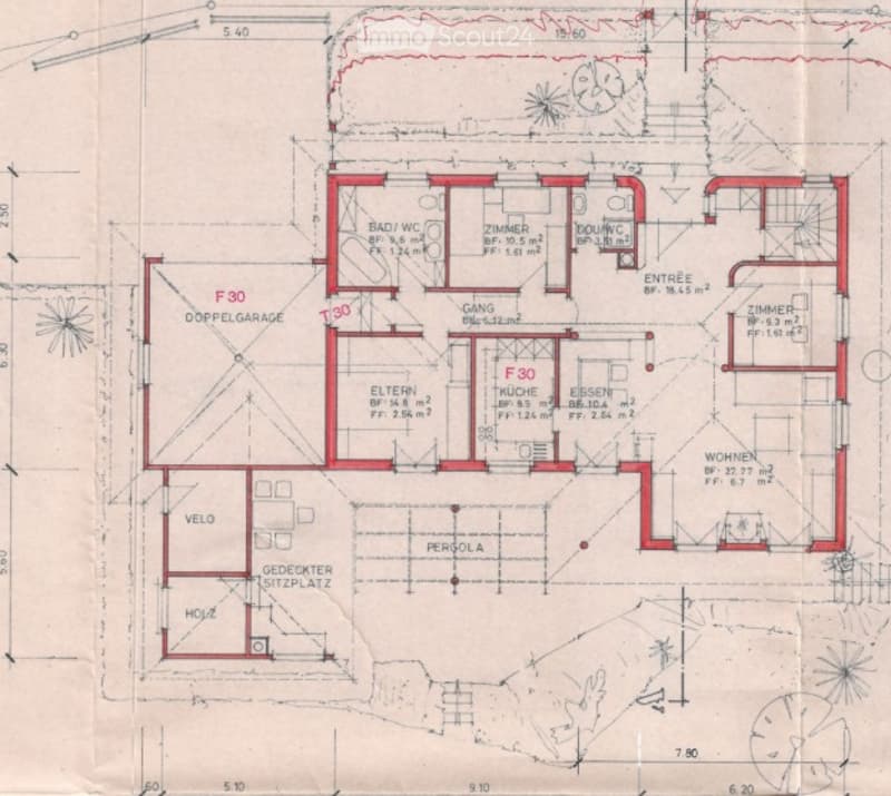 Floor plan of a house with multiple rooms including living room, kitchen, bedrooms, bathrooms, and a double garage.