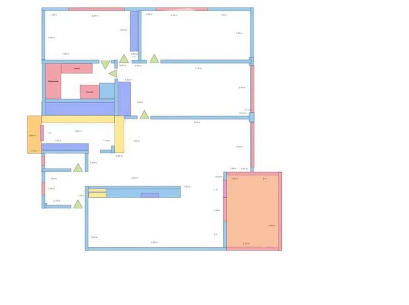 Floor plan of a house with multiple rooms including living room, kitchen, bedrooms, bathrooms, and a balcony.