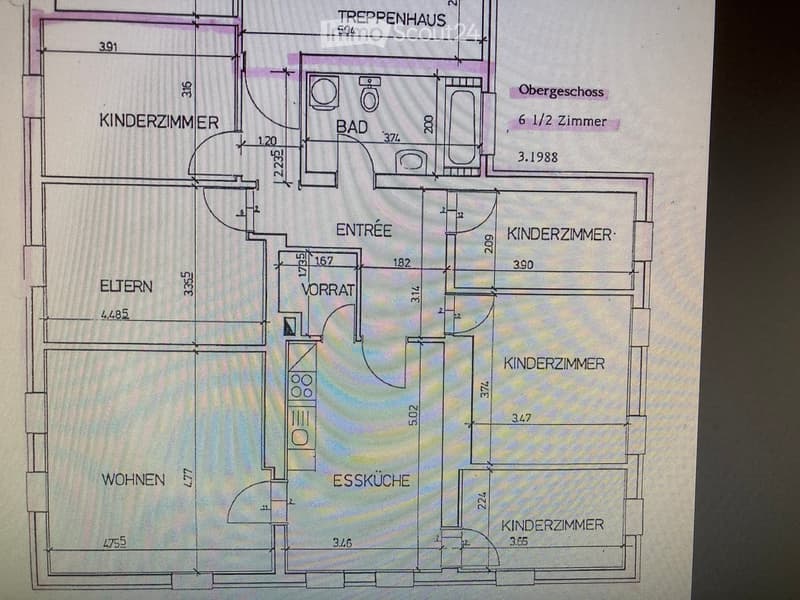 Floor plan showing a multi-level house layout with labeled rooms including living area, dining kitchen, bedrooms, bathrooms, and a staircase leading to an upper floor.