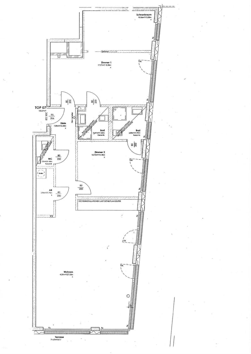 Floor plan showing a multi-room layout including a living area, two bedrooms, two bathrooms, a kitchen, and a terrace.