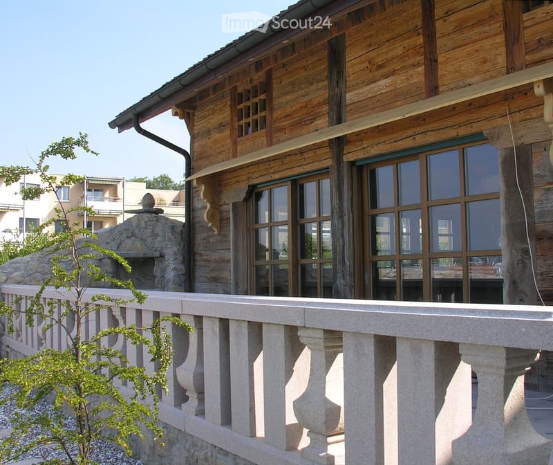 wooden exterior, balcony, double glass windows, stone foundation, rock-faced fireplace