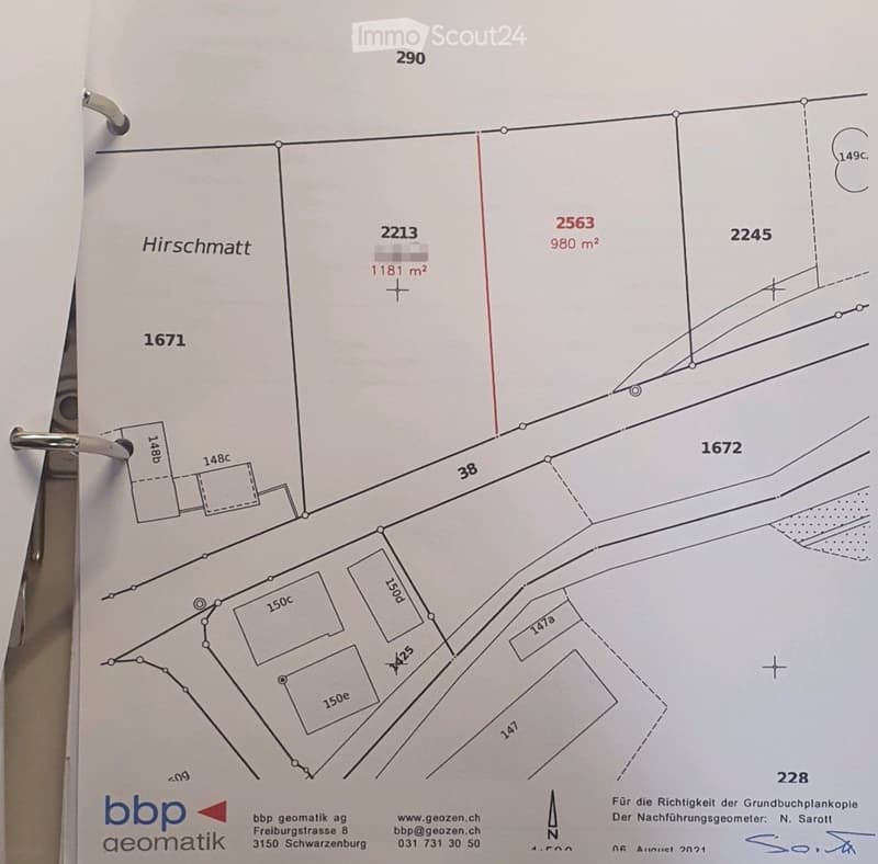 Property plot map showing multiple parcels with area measurements in square meters, labeled with parcel numbers and dimensions.