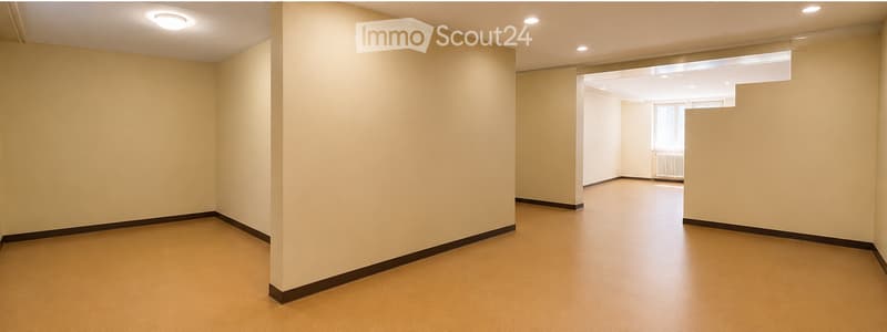 Empty room with light yellow walls and a smooth, light-colored floor. No furniture or equipment is present.