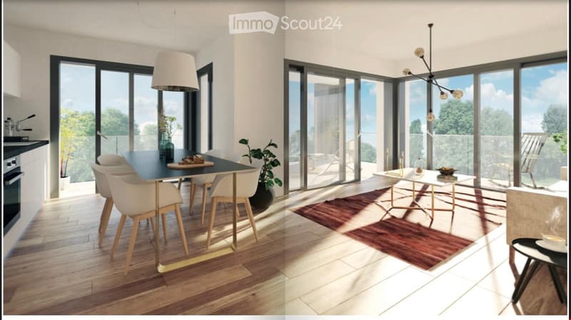Modern open-plan living and dining area with large windows offering a scenic view, featuring a dining table with chairs, a coffee table, a sofa, pendant lights, decorative vases, plants, and a candle on the coffee table. The kitchen area includes an oven