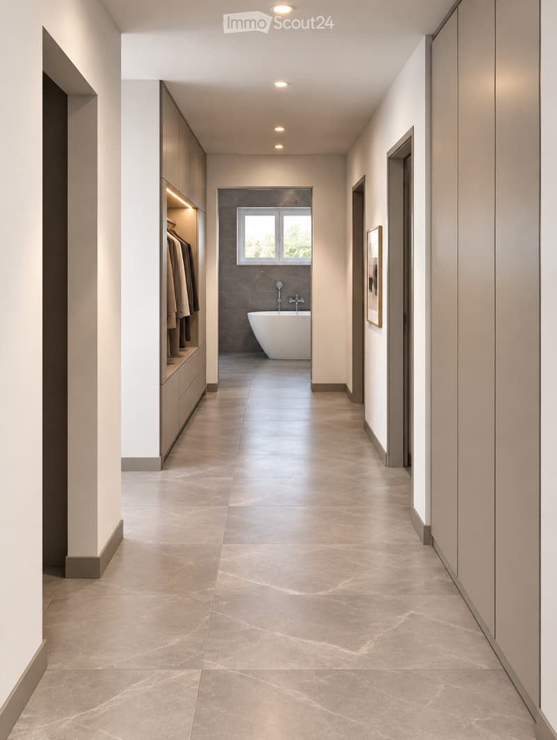 Modern hallway with light-colored tiles, built-in wardrobe, and a small bathroom area visible at the end, featuring a bathtub and a window.