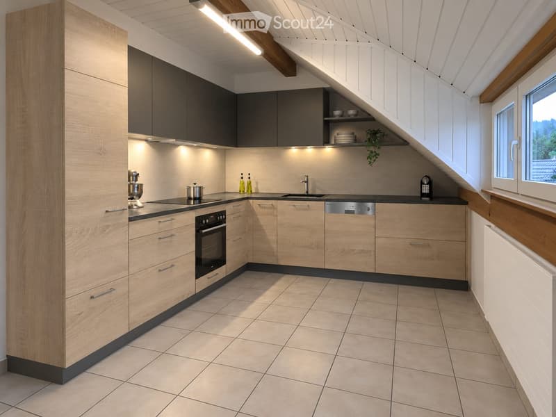 Modern kitchen with light wood cabinets, stainless steel appliances, and a black countertop. Features an oven, sink, dishwasher, mixer, coffee maker, and decorative bottles on the counter.