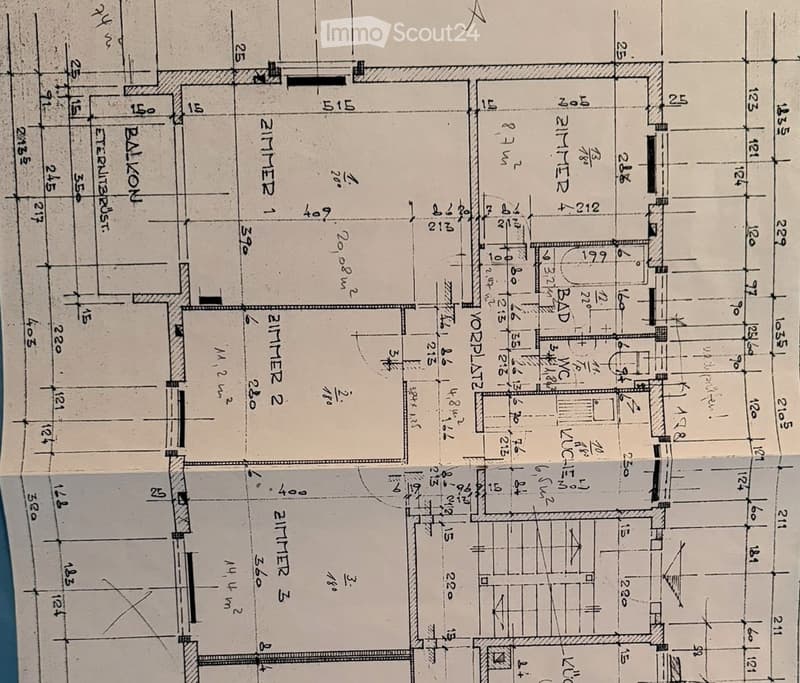 Floor plan showing a multi-room layout including a living room, kitchen, bedrooms, bathrooms, and a balcony.