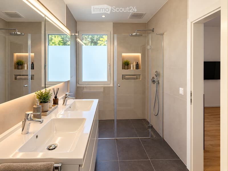 Modern bathroom with double sink, large mirror, glass-enclosed shower, and built-in storage shelves with plants and toiletries.