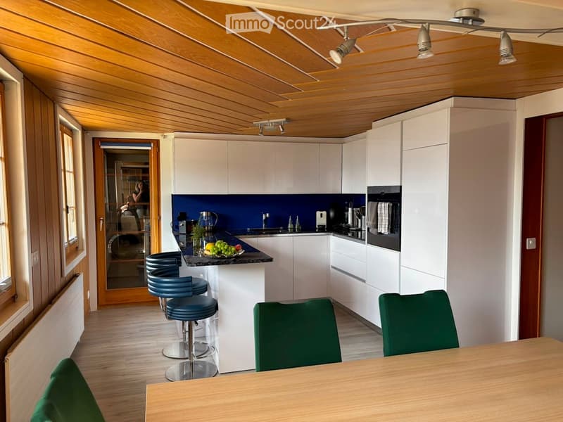 {"type": "Furnished Room", "objects": ["stool", "chair", "table", "cupboard", "sink", "faucet", "oven", "fridge", "dishwasher", "bottle", "fridge", "cupboard", "stool", "stool", "stool", "stool", "stool", "stool", "stool", "stool", "stool", "stool", "stoo
