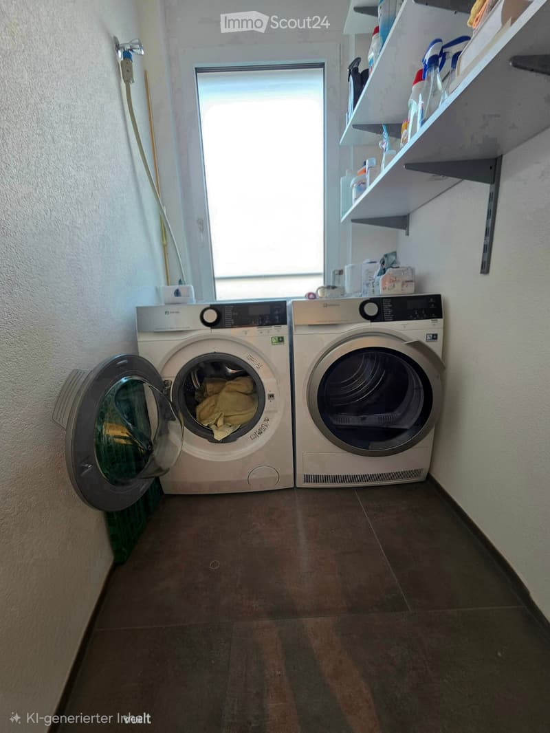 A small bathroom with a washing machine and dryer placed side by side, shelves with cleaning supplies above, and a window providing natural light.