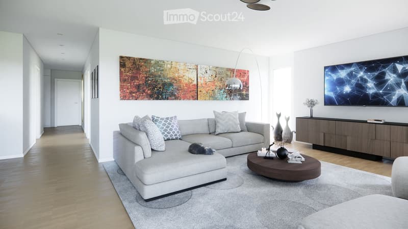 Modern living room with a grey sectional sofa, coffee table, ottoman, floor lamp, flat-screen TV, and decorative vases.