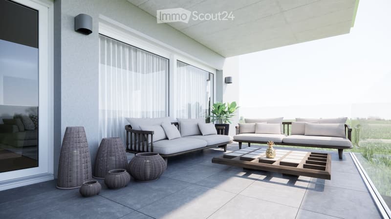 Modern balcony with large windows, white sofa, coffee table, decorative vases, and a potted plant, overlooking a scenic view.