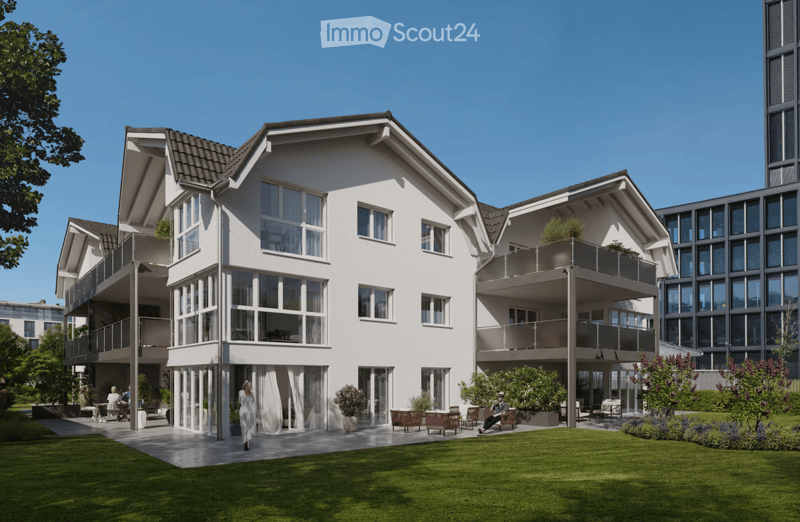 Modern two-story residential building with white exterior, large windows, balconies, and surrounding greenery.