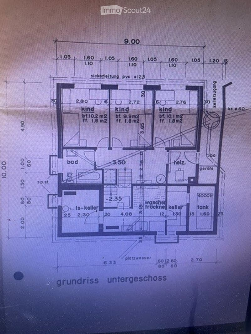 Ground floor plan showing a kitchen, two bedrooms, bathroom, hallway, laundry room, and storage area.