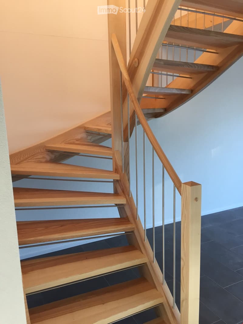 wooden staircase with metal handrail, 8 steps