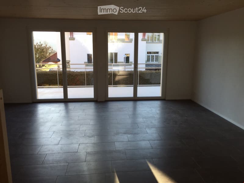 empty room, large windows, balcony, tiled floor