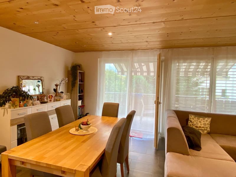 wooden table, 6 chairs, white cabinet, mirror, bookshelf, couch, balcony, view