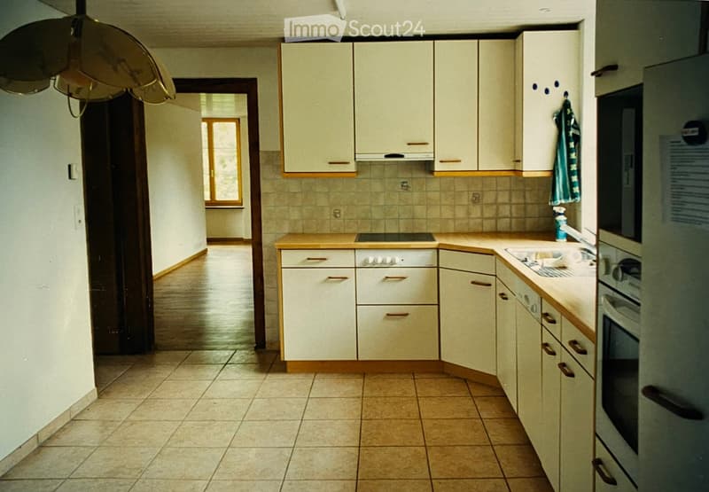 {"type": "Kitchen", "objects": ["cabinets", "sink", "oven", "faucet", "faucet handle", "oven handle", "oven door", "oven knob", "oven control panel", "oven control knob", "oven control switch", "oven control switch", "oven control switch", "oven control s