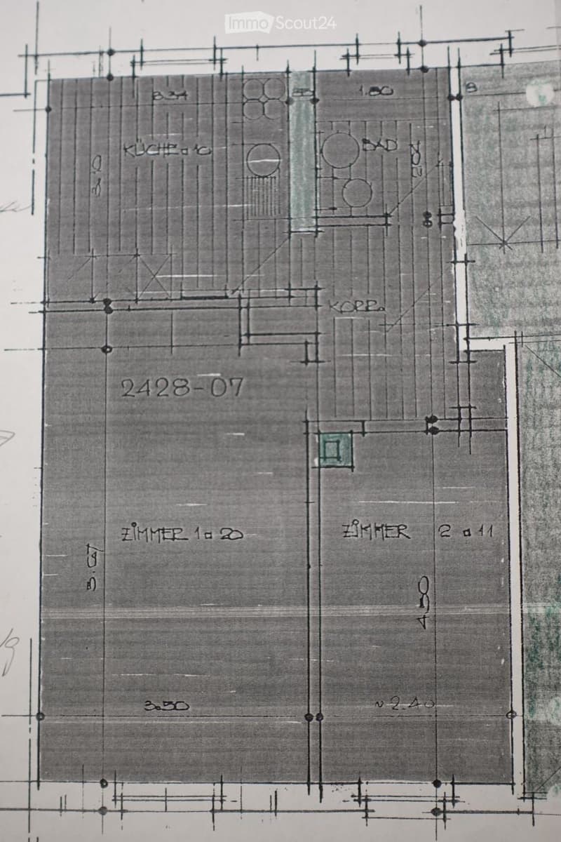 Floor plan showing a kitchen, bathroom, two bedrooms, and a hallway.