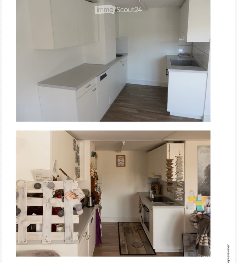 The kitchen features white cabinets, a grey countertop, and a sink. A wine rack is visible on the left side, and a picture frame hangs on the wall. The floor is wooden.