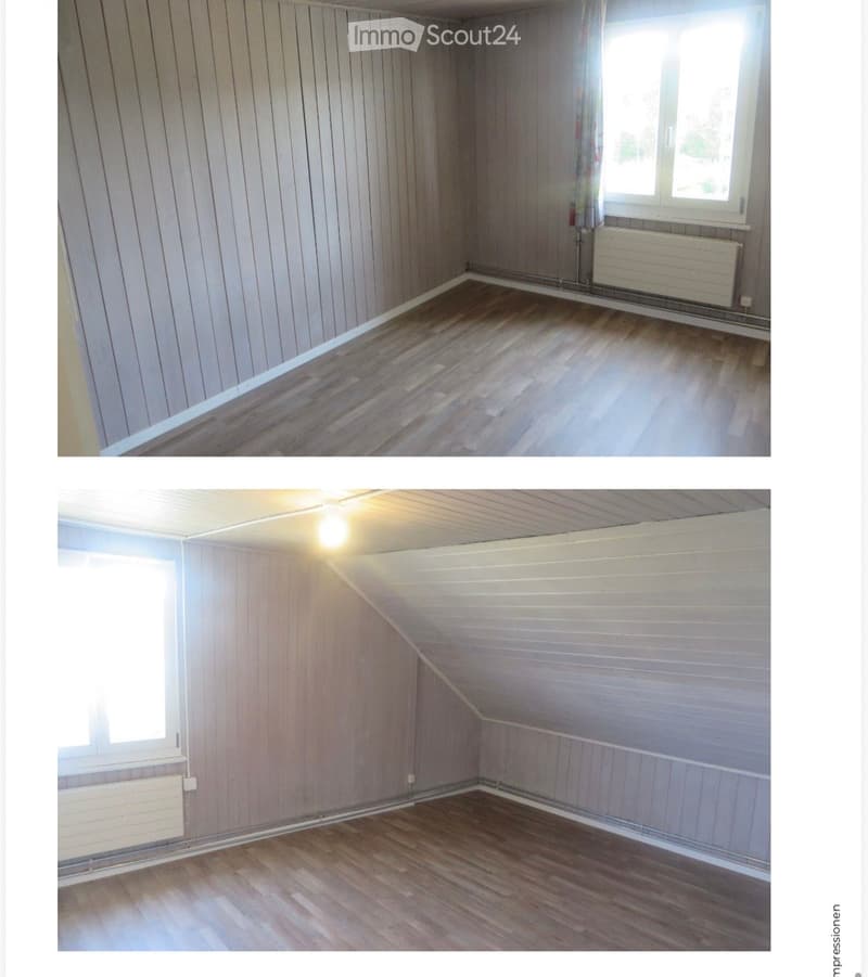 Empty room with wooden flooring and paneled walls, featuring a window and radiator. No furniture or personal items present.