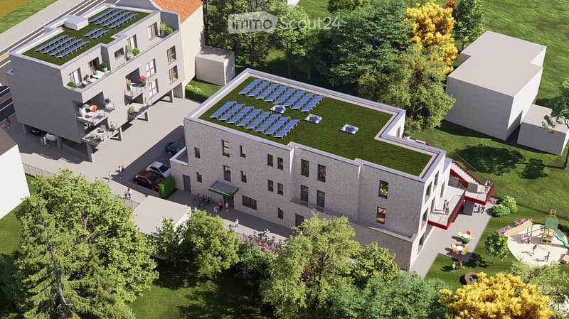 A modern multi-story residential building with a rooftop terrace, parking area, and surrounding greenery.