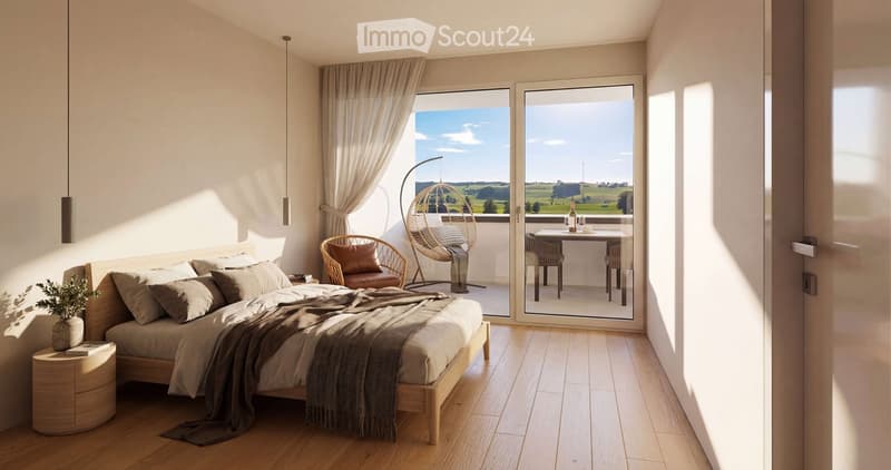 Modern bedroom with wooden flooring, large windows offering a scenic view, a bed with pillows and blankets, a nightstand with a plant, a wicker hanging chair, and a small table with chairs on the balcony.