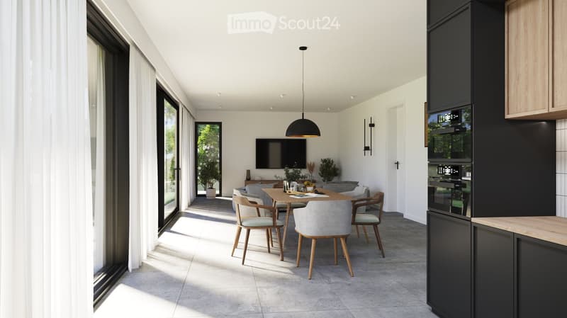 Modern, open-plan living and dining area with large windows, a dining table with chairs, a television, and a kitchen area with cabinets and an oven.