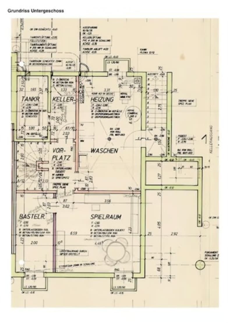 Ground floor plan showing multiple rooms including a tank room, cellar, heating room, wash area, living room, and play area.
