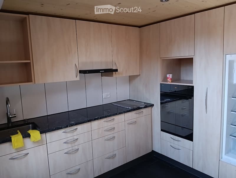 wood cabinets, granite countertop, stainless steel appliances, tiled backsplash, dishwasher, sink
