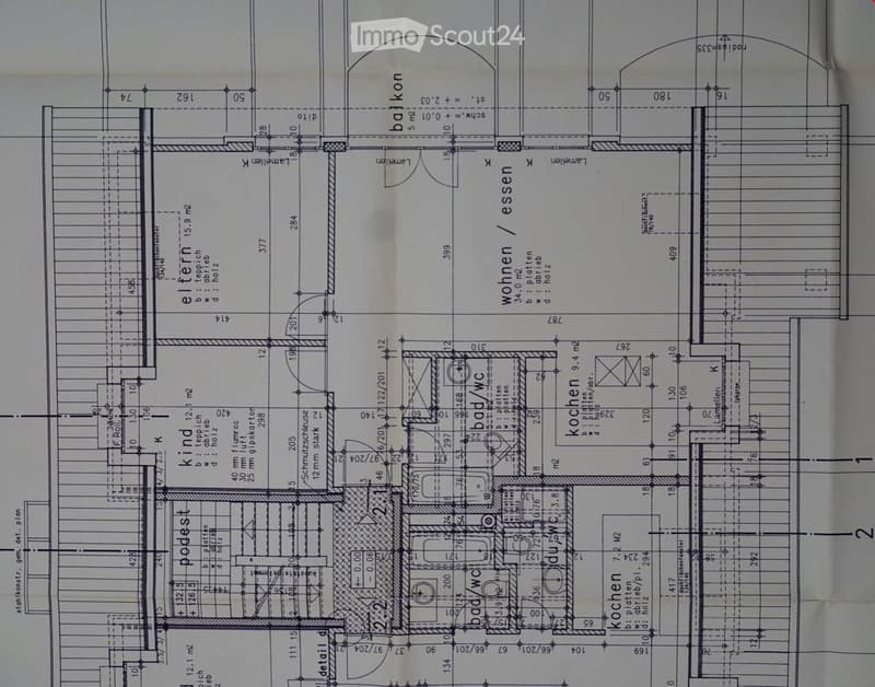 Floor plan showing a multi-room layout including living room, dining room, kitchen, bedrooms, bathrooms, and a balcony.
