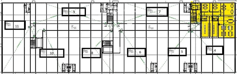 Floor plan of a multi-story building with labeled rooms and sections, including offices, meeting rooms, and common areas.