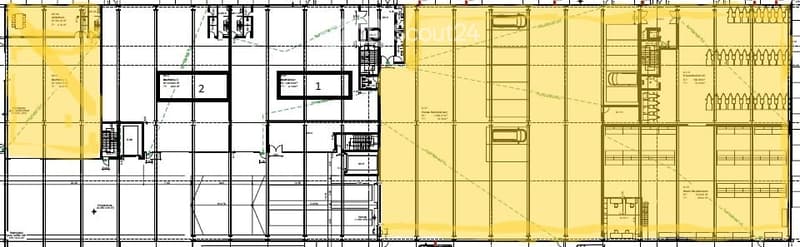 Floor plan of a multi-story building with labeled rooms, including offices, meeting rooms, and common areas.