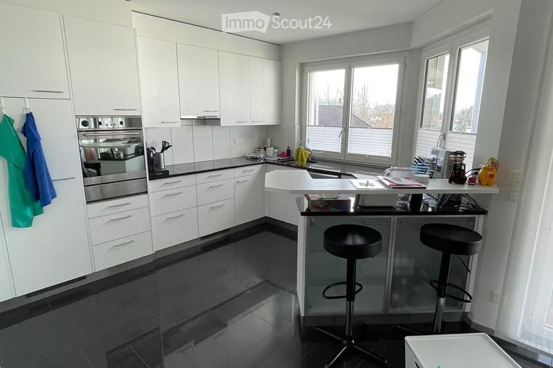 {"type": "Kitchen", "objects": ["oven", "cabinets", "stool", "stool", "sink", "faucet", "cupboard", "cupboard", "cupboard", "cupboard", "cupboard", "cupboard", "cupboard", "cupboard", "cupboard", "cupboard", "cupboard", "cupboard", "cupboard", "cupboard",