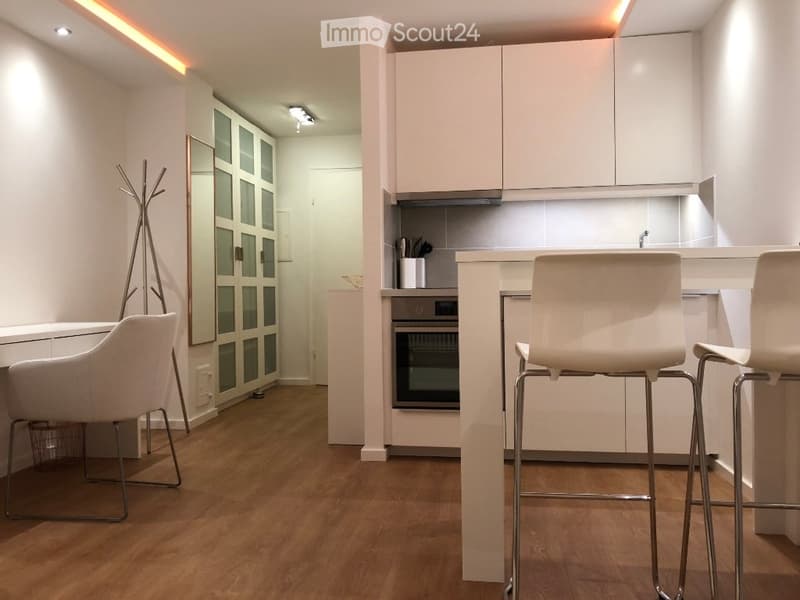 {"type": "Furnished Room", "objects": ["stool", "stool", "stool", "chair", "mirror", "oven", "faucet", "cabinet", "cabinet", "cabinet", "cabinet", "cabinet", "cabinet", "cabinet", "cabinet", "cabinet", "cabinet", "cabinet", "cabinet", "cabinet", "cabinet"
