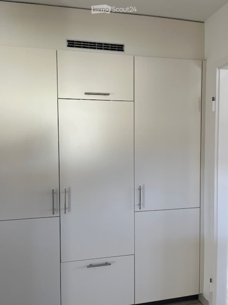 closet with drawers and cabinet doors
